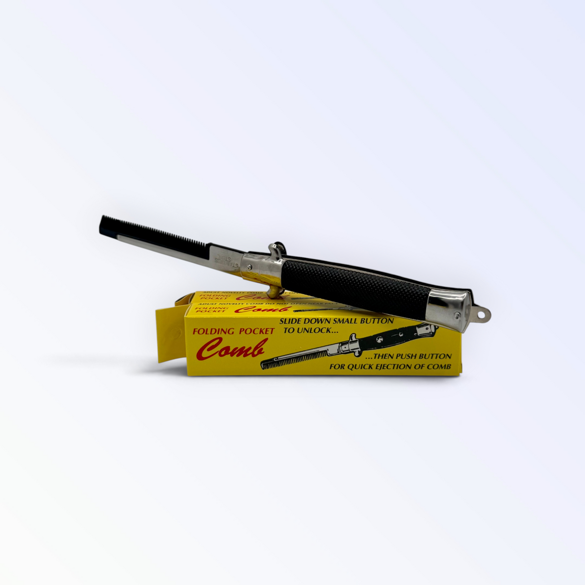 Switchblade Comb (Novelty)