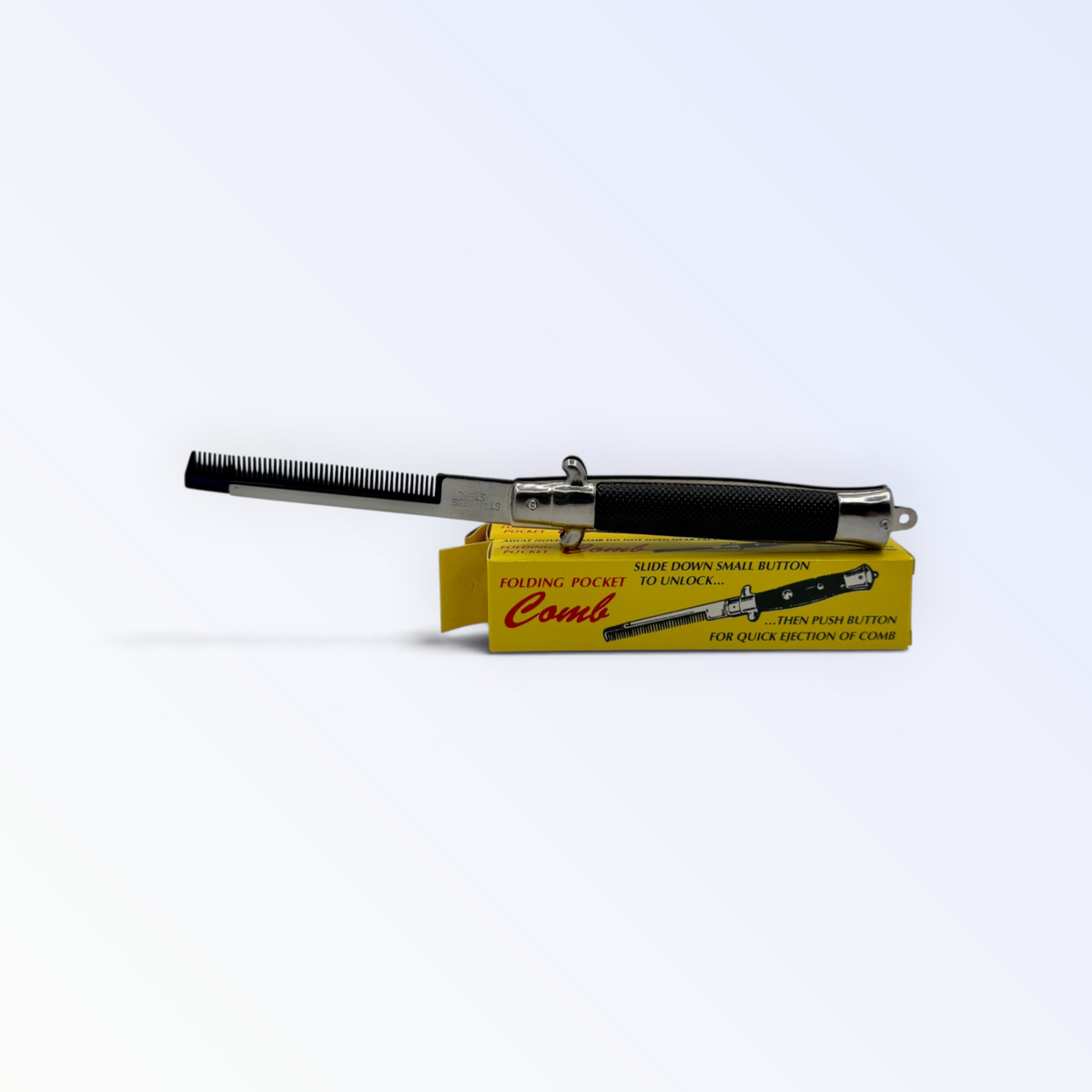 Switchblade Comb (Novelty)