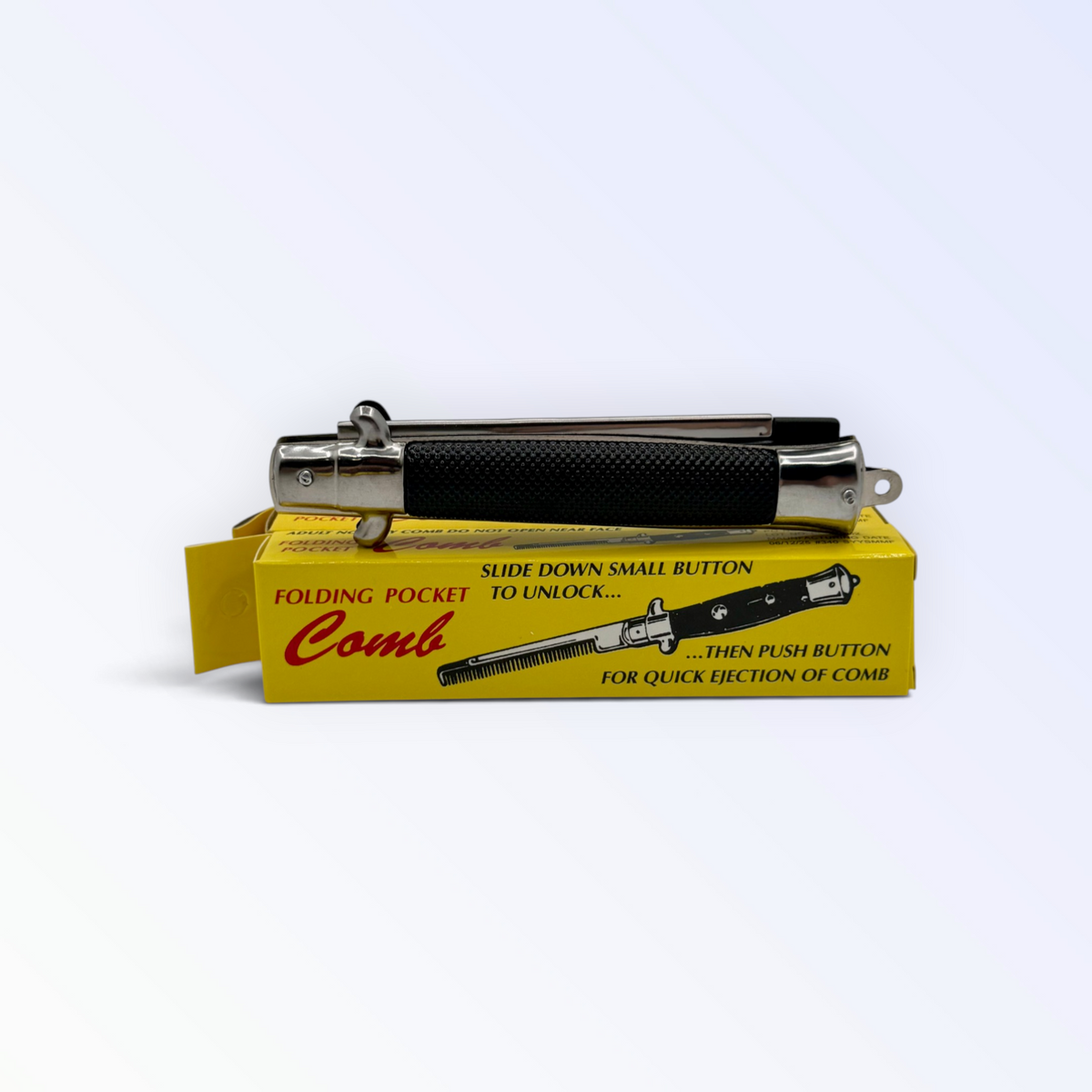 Switchblade Comb (Novelty)