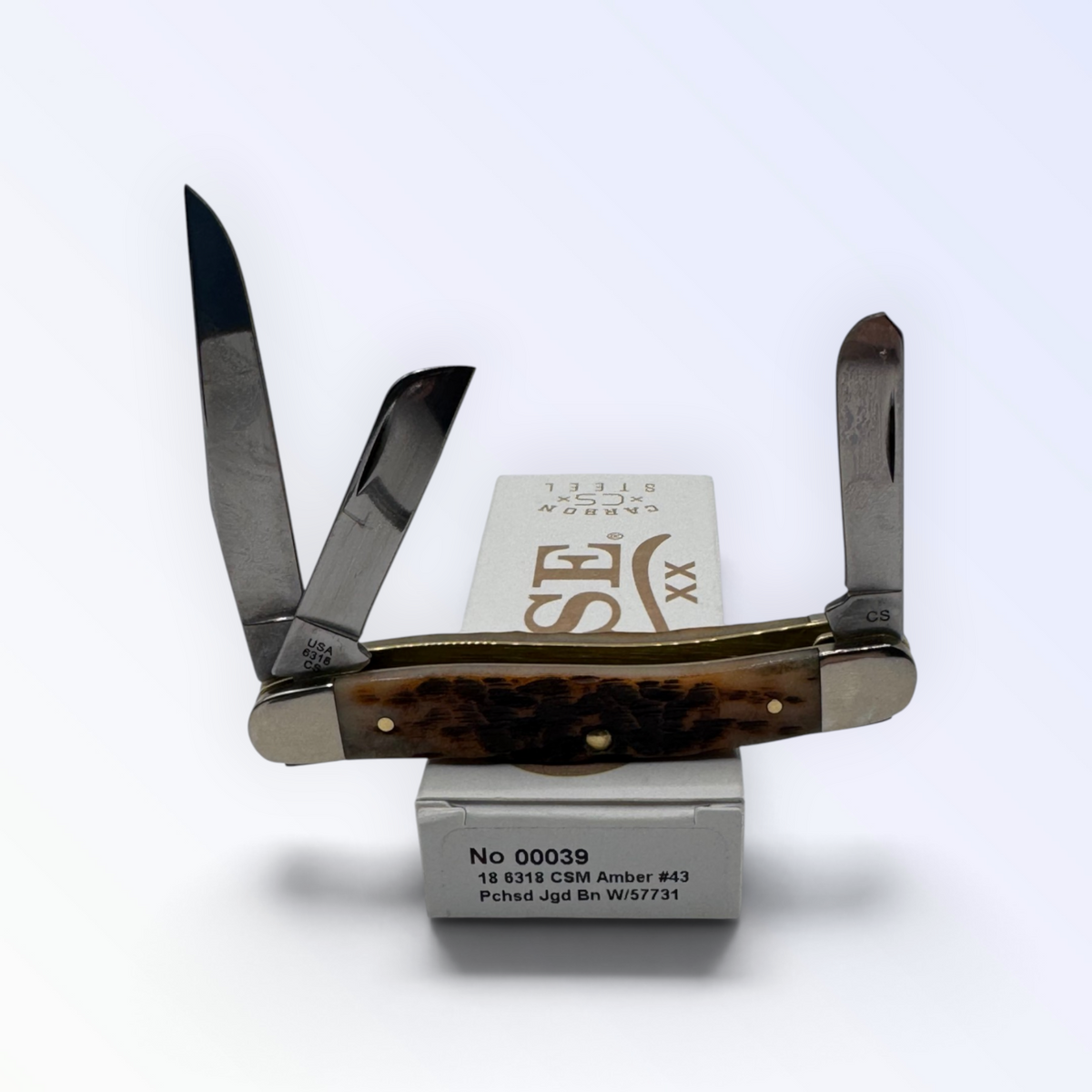 Pigeon Roost Knives Case XX Medium Stockman pocket knife with amber bone handle and three carbon steel blades