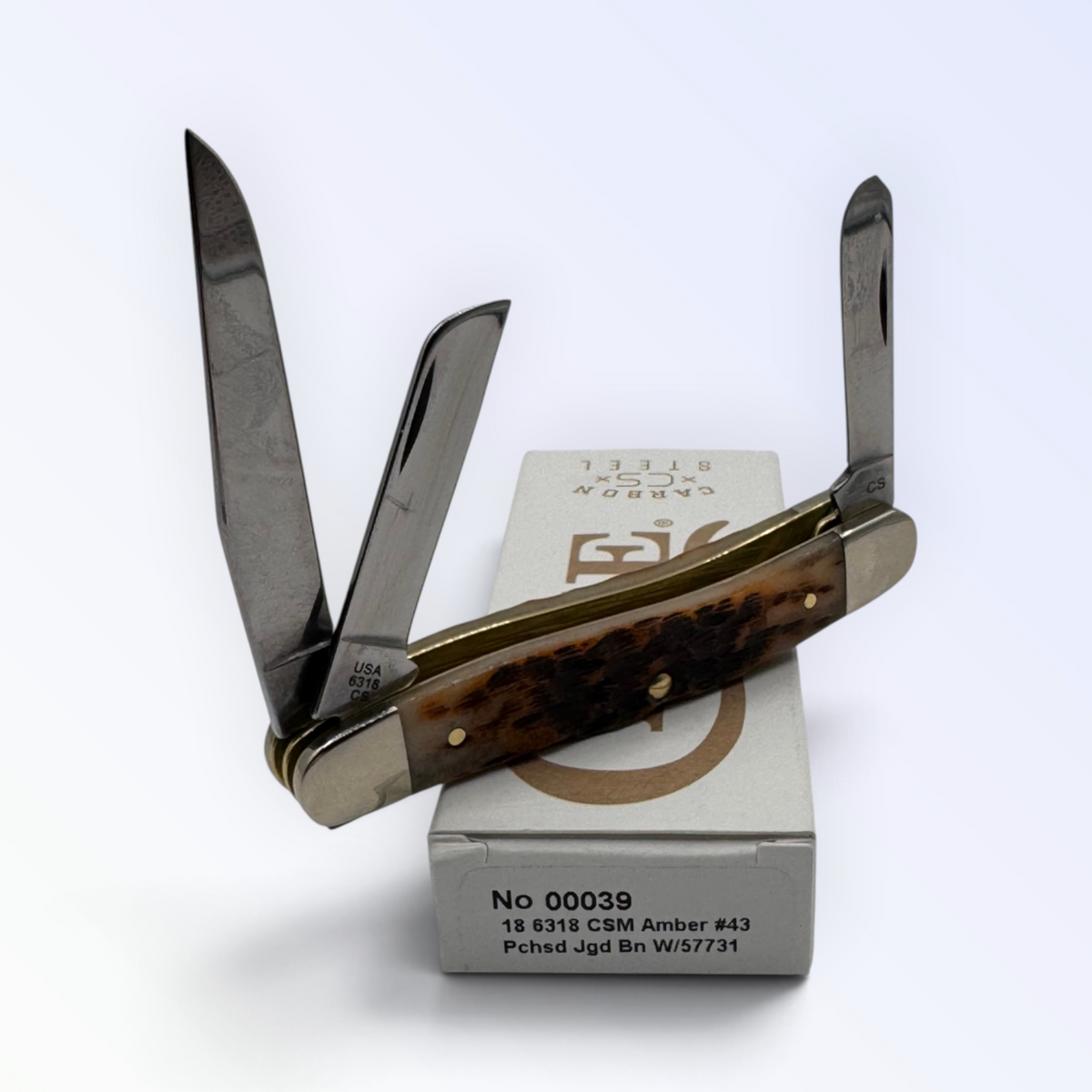 Pigeon Roost Knives Case XX Medium Stockman pocket knife with amber bone handle and three carbon steel blades