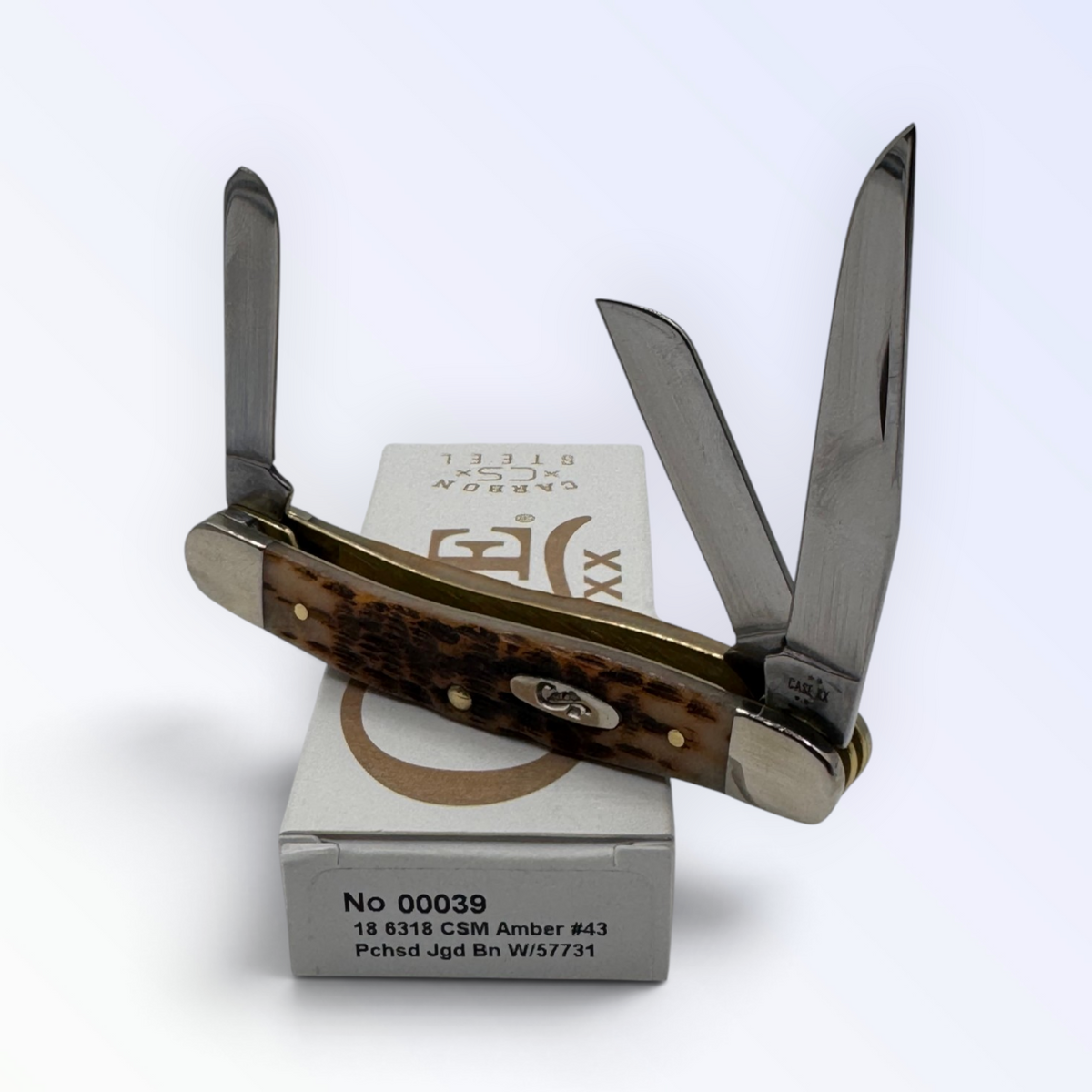Pigeon Roost Knives Case XX Medium Stockman pocket knife with amber bone handle and three carbon steel blades