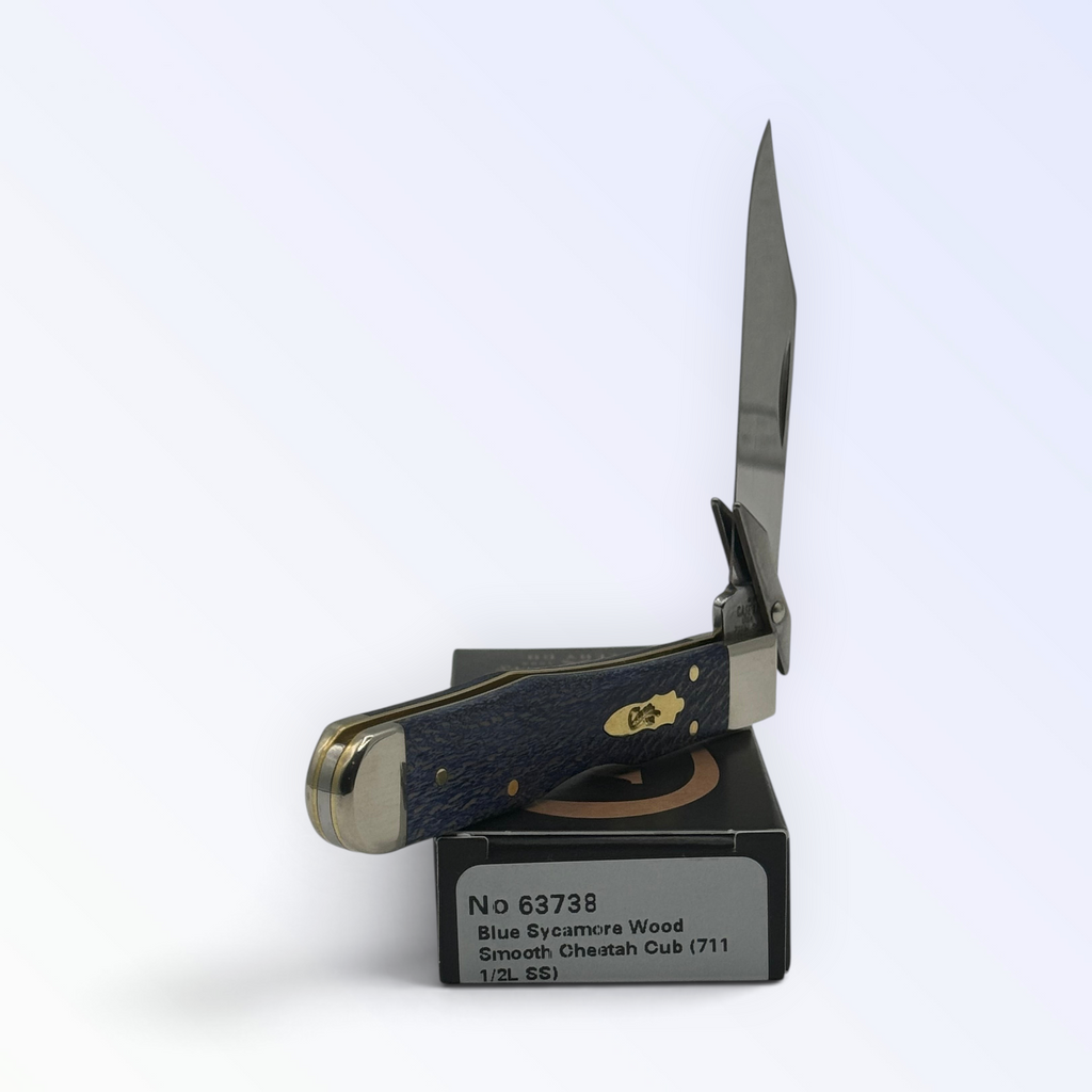 Pigeon Roost Knives Case XX Cheetah Cub pocket knife with blue sycamore wood handle and swing guard open on its box