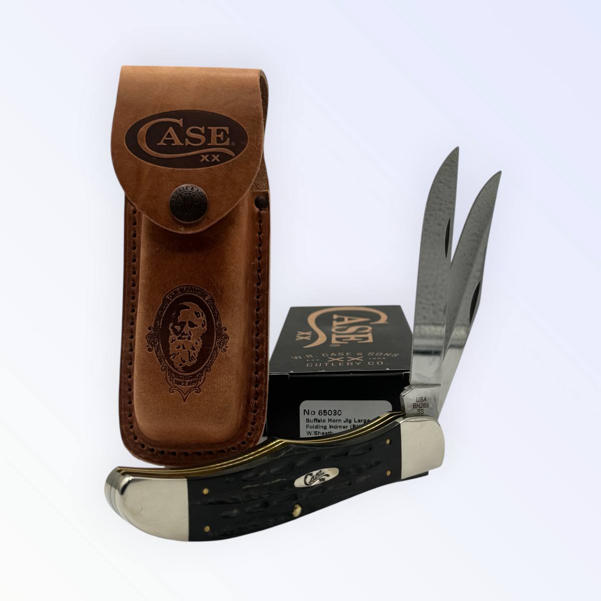 Pigeon Roost Knives Case XX Folding Hunter knife with jigged buffalo horn handle, two blades, and leather belt sheath.