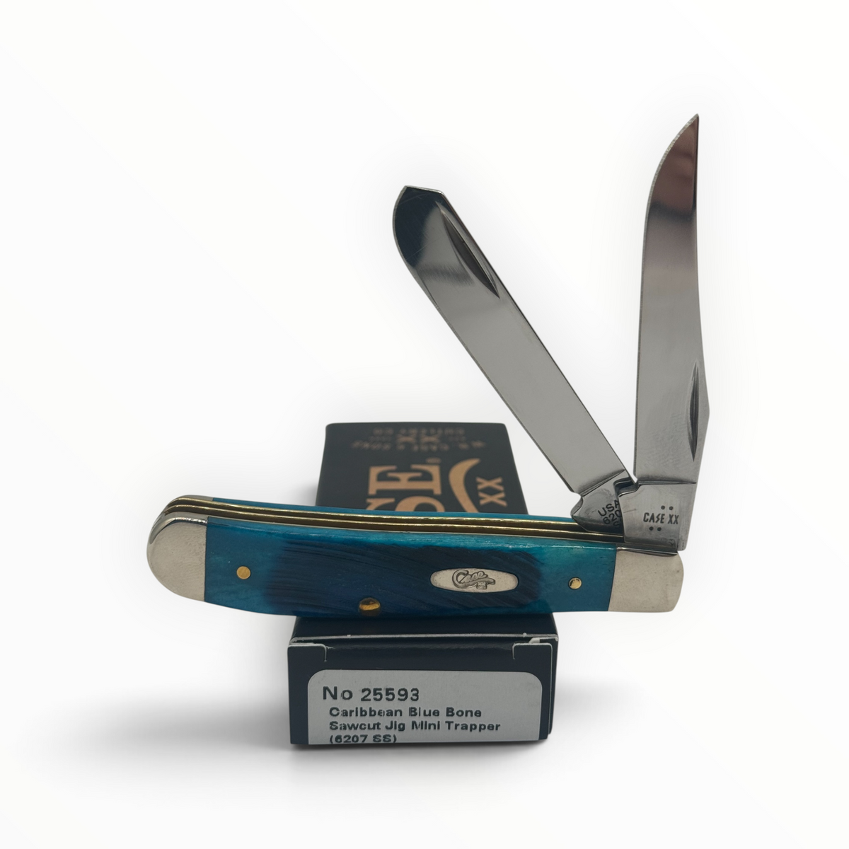 Pigeon Roost Knives Case XX Mini Trapper with Caribbean blue sawcut jigged bone handle and two stainless steel blades.