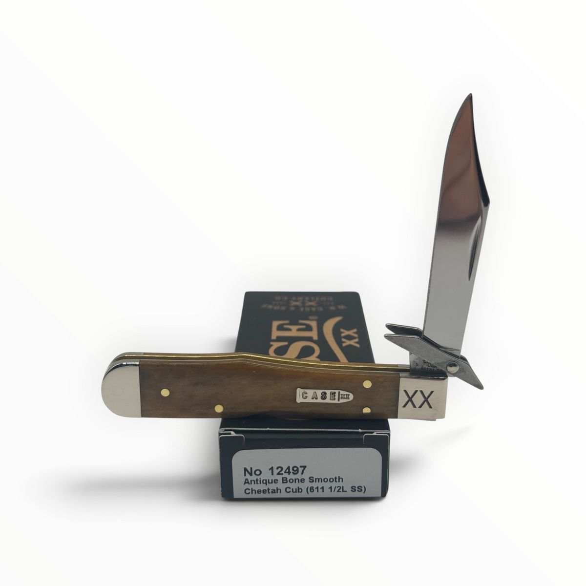 Pigeon Roost Knives Case XX Cheetah Cub with smooth antique bone handle and locking clip blade with swing guard