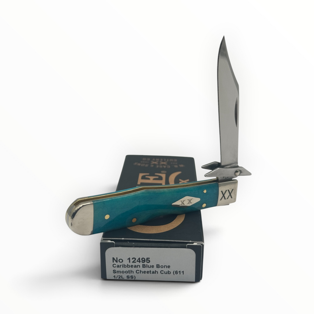 Pigeon Roost Knives Case XX Cheetah Cub pocket knife with smooth Caribbean blue bone handle and swing guard blade.