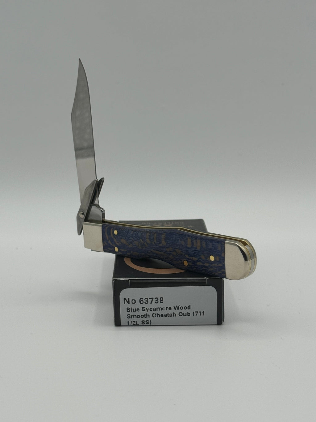 Pigeon Roost Knives Case XX Cheetah Cub pocket knife with blue sycamore wood handle and swing guard blade