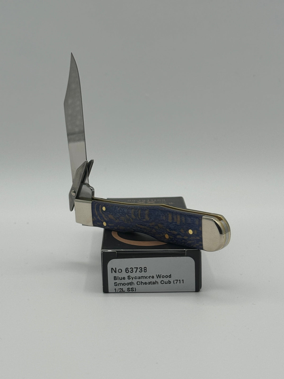 Pigeon Roost Knives Case XX Cheetah Cub pocket knife with blue sycamore wood handle and swing guard blade