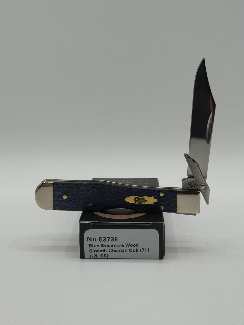 Pigeon Roost Knives Case XX Cheetah Cub pocket knife with blue sycamore wood handle and swing guard blade