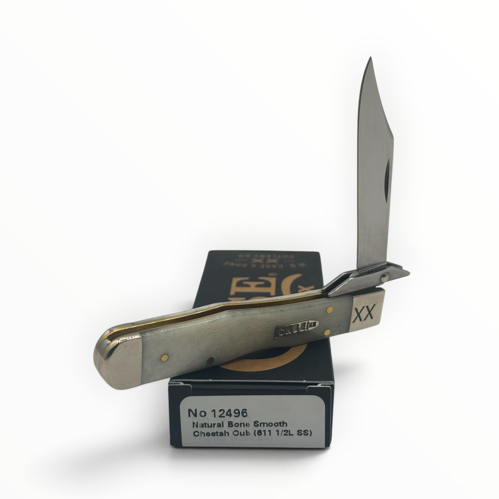 Pigeon Roost Knives Case XX Cheetah Cub pocket knife with smooth natural bone handle and swing guard on its box