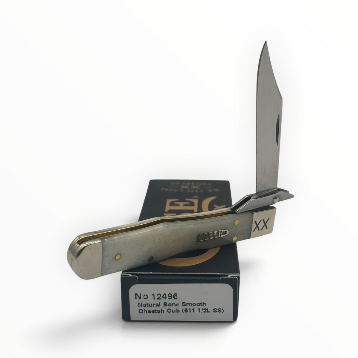 Pigeon Roost Knives Case XX Cheetah Cub pocket knife with smooth natural bone handle and swing guard on its box