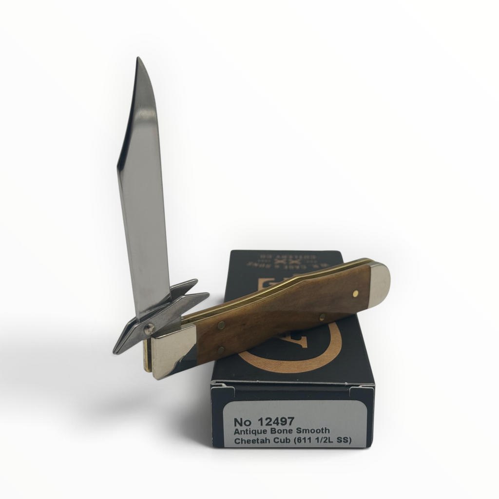 Pigeon Roost Knives Case XX Cheetah Cub with smooth antique bone handle, locking clip blade, and swing guard.