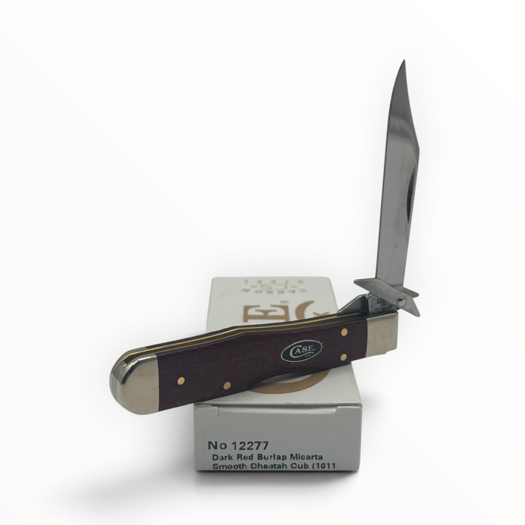 Pigeon Roost Knives Case XX Cheetah Cub with dark red burlap Micarta handle, swing guard, and carbon steel blade.