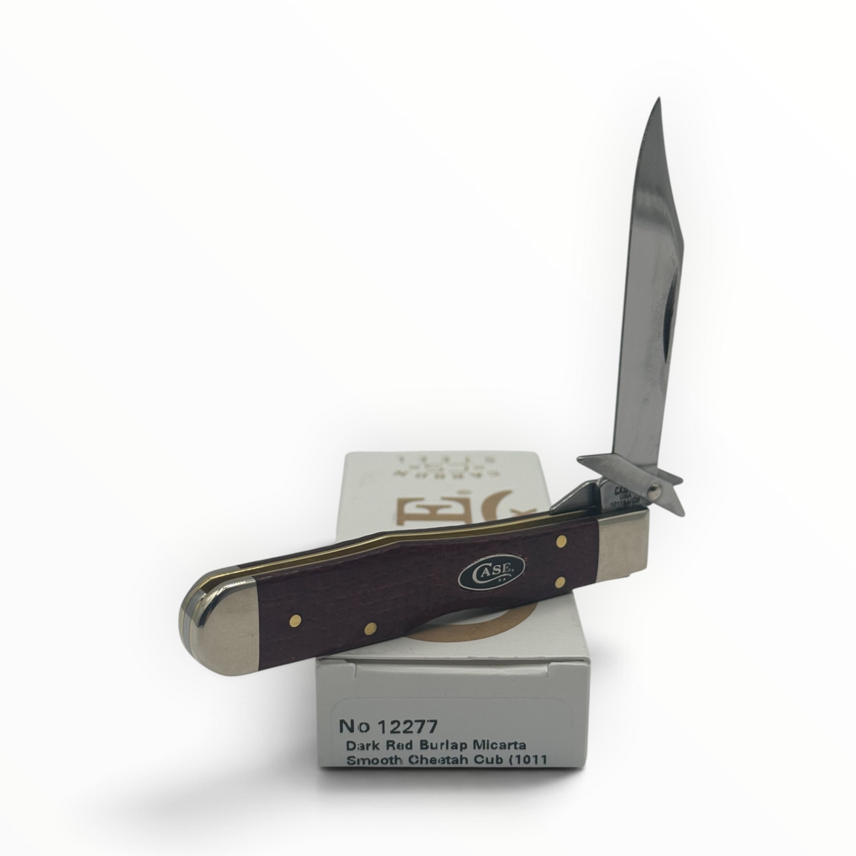 Pigeon Roost Knives Case XX Cheetah Cub with dark red burlap Micarta handle, swing guard, and carbon steel blade.