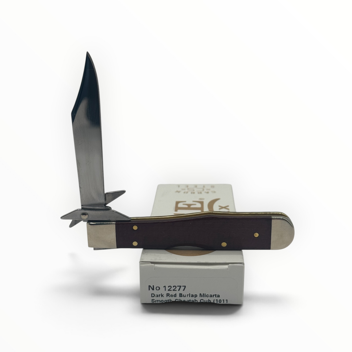 Pigeon Roost Knives Case XX Cheetah Cub with dark red burlap Micarta handle, swing guard, and carbon steel blade.