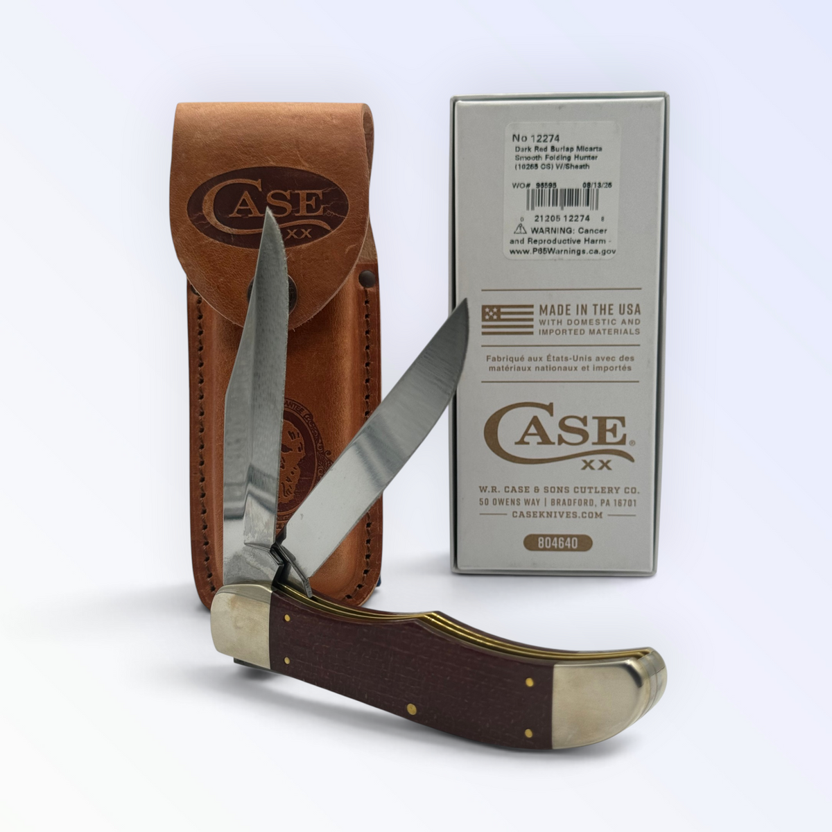 Pigeon Roost Knives Case XX Folding Hunter with dark red burlap Micarta handle, carbon steel blades, and leather sheath