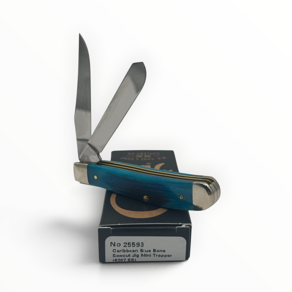 Pigeon Roost Knives Case XX Mini Trapper with Caribbean blue sawcut jigged bone handle and two stainless steel blades.