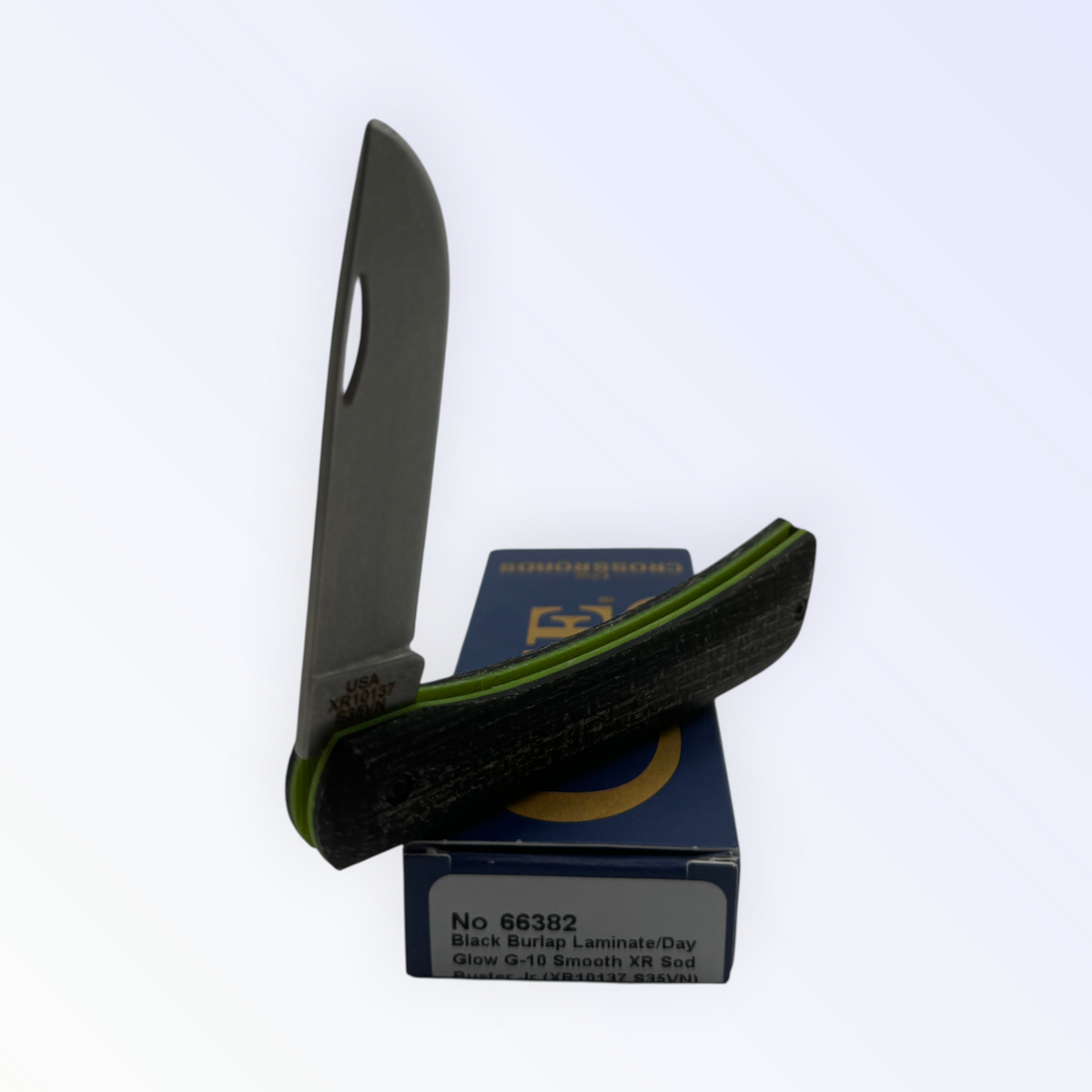 Pigeon Roost Knives Case XX Sod Buster Jr with black burlap laminate handle, day glow G-10 liners, and skinner blade.