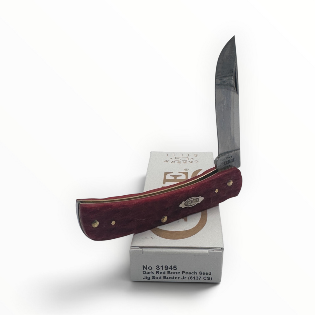 Pigeon Roost Knives Case XX Sod Buster Jr pocket knife with dark red peach seed jigged bone handle and skinner blade