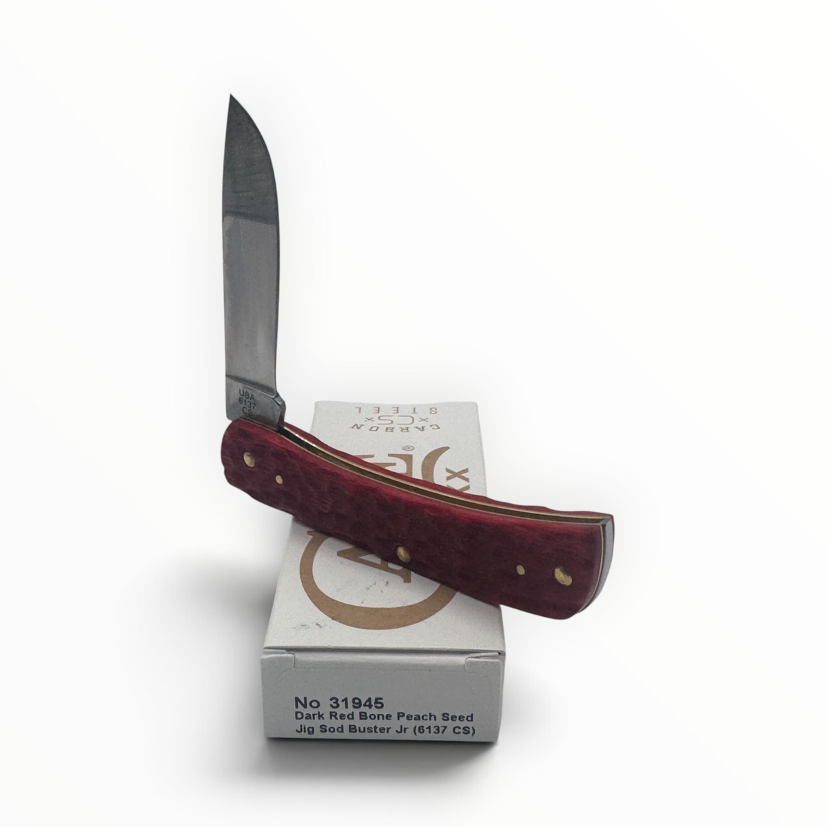 Pigeon Roost Knives Case XX Sod Buster Jr pocket knife with dark red peach seed jigged bone handle and carbon blade