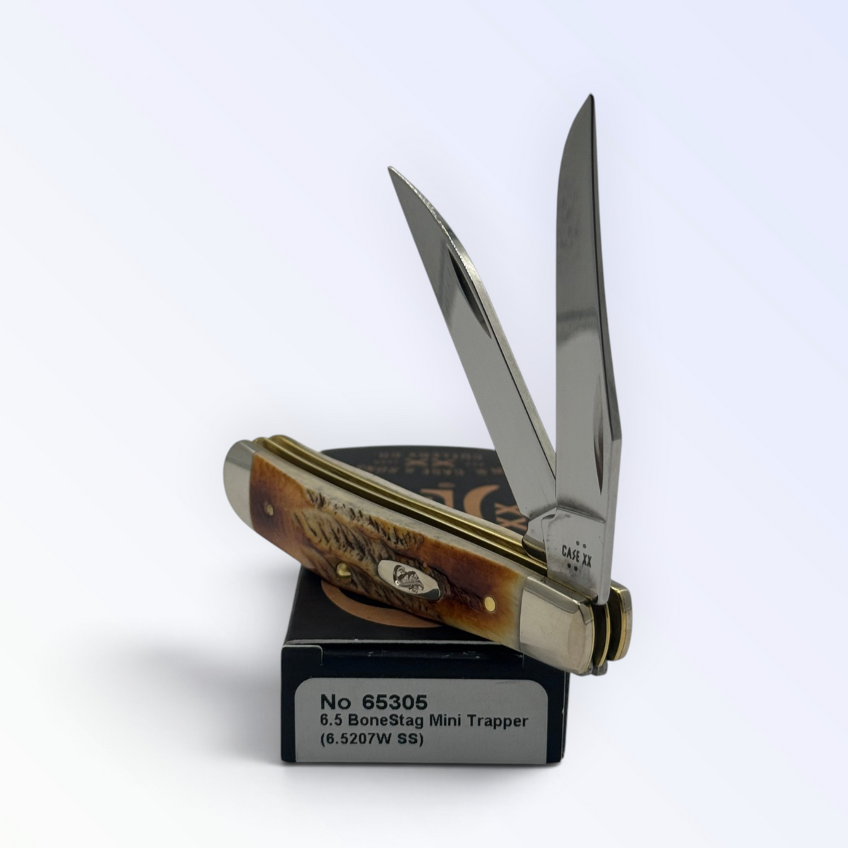 Case XX 65305 – 6.5 BoneStag Mini Trapper — angled open view on Case XX packaging