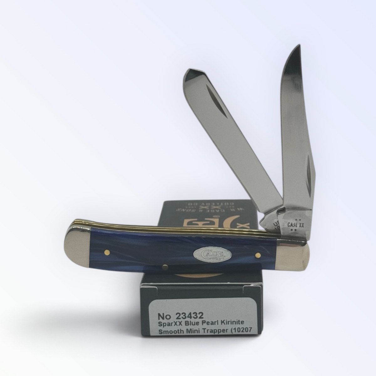 Case XX Blue Pearl Kirinite Mini Trapper with SKU 23432 — blades open resting on the factory box