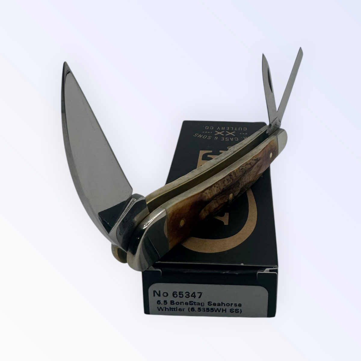 Pigeon Roost Knives Case XX 65347 Seahorse Whittler pocket knife with 6.5 BoneStag handle and three stainless blades.