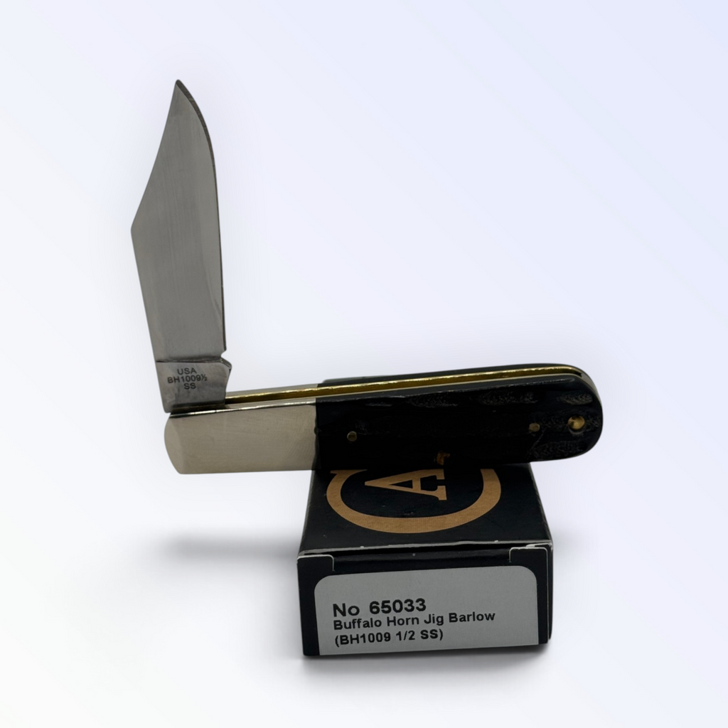 Case XX Buffalo Horn Jig Barlow CA65033 — close view of jigged buffalo horn handle with blade open on box