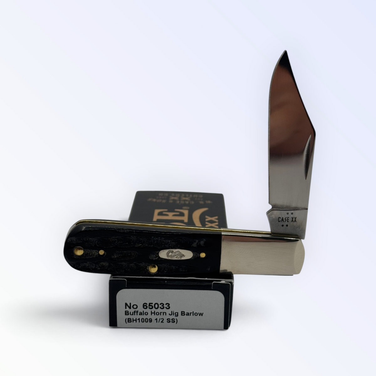 Case XX Buffalo Horn Jig Barlow CA65033 — open stainless clip blade resting on the factory box