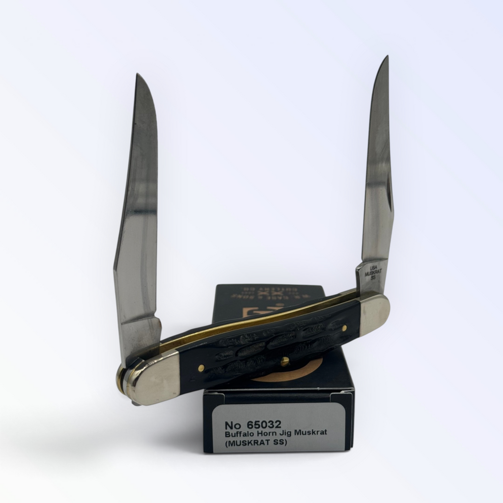 Case XX – Buffalo Horn Jig Muskrat (65032) — pocket-knife studio shot on retail box