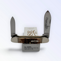 Pigeon Roost Knives Case XX Canoe pocket knife with amber bone peach seed jigged handle and dual carbon steel blades 00263