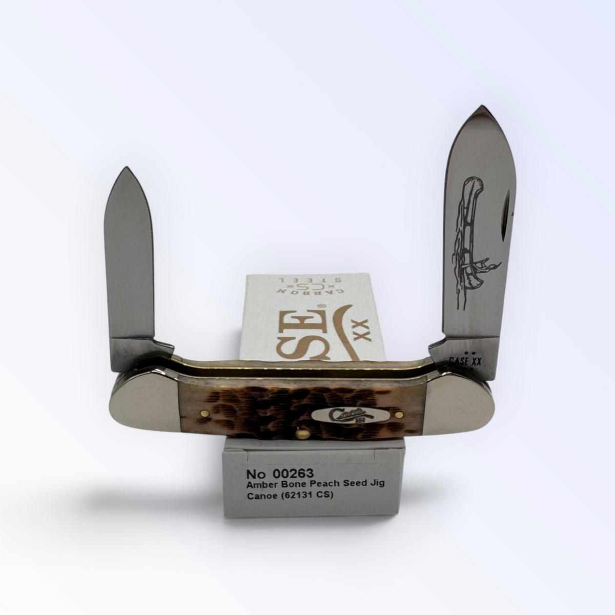 Pigeon Roost Knives Case XX Canoe pocket knife with amber bone peach seed jigged handle and dual carbon steel blades 00263