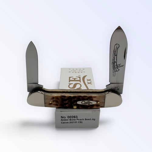 Pigeon Roost Knives Case XX Canoe pocket knife with amber bone peach seed jigged handle and dual carbon steel blades 00263