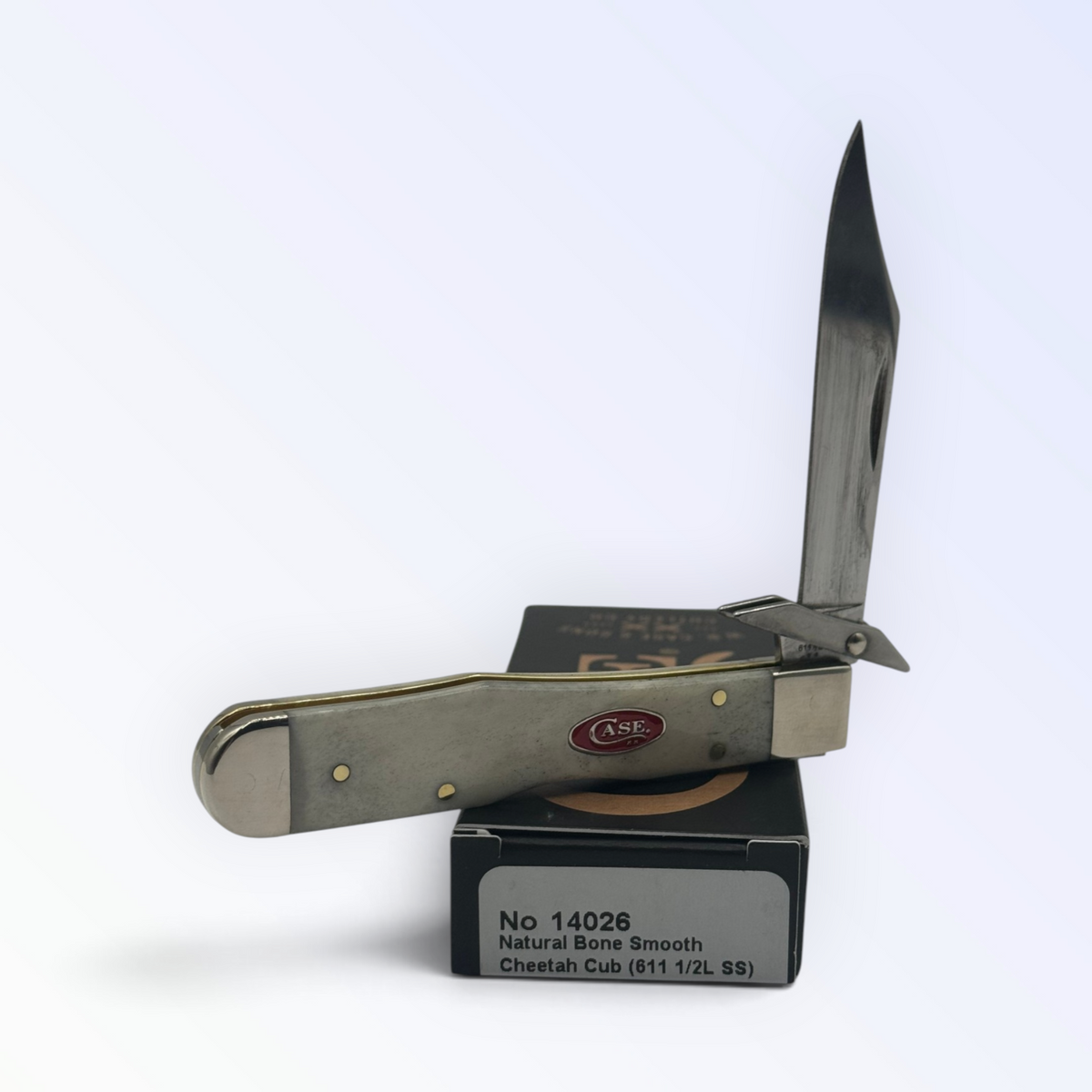 Cheetah Cub by Case XX featuring Smooth Natural Bone (14026), pocket-knife studio shot on retail box