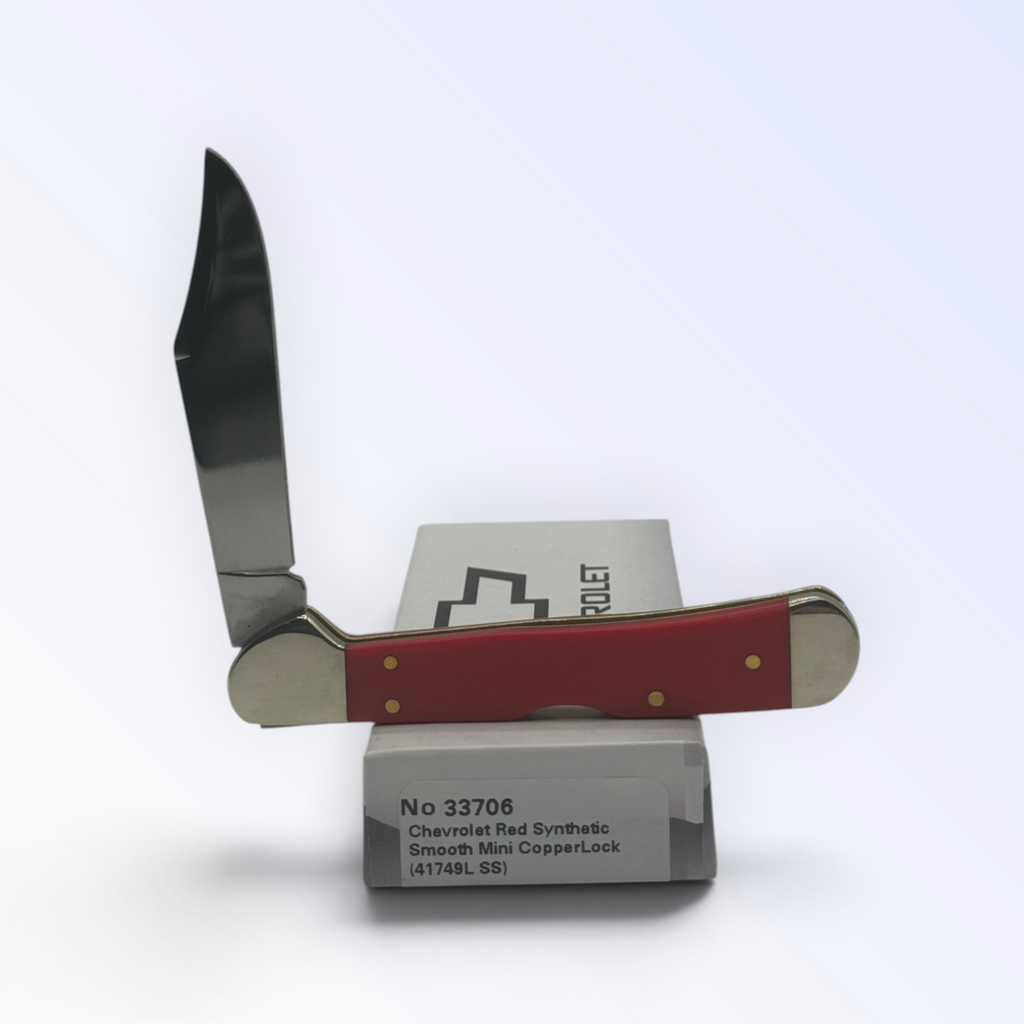 Chevrolet Red Synthetic Mini Copperlock by Case XX (33706), close view of handle texture with blades open on box