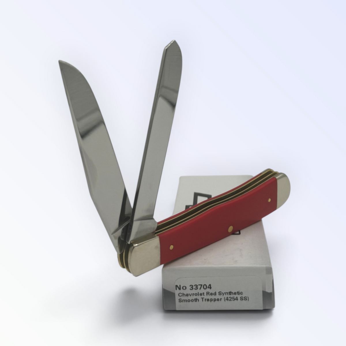 Case XX Chevrolet Red Synthetic Trapper (33704) — pocket-knife studio shot on retail box