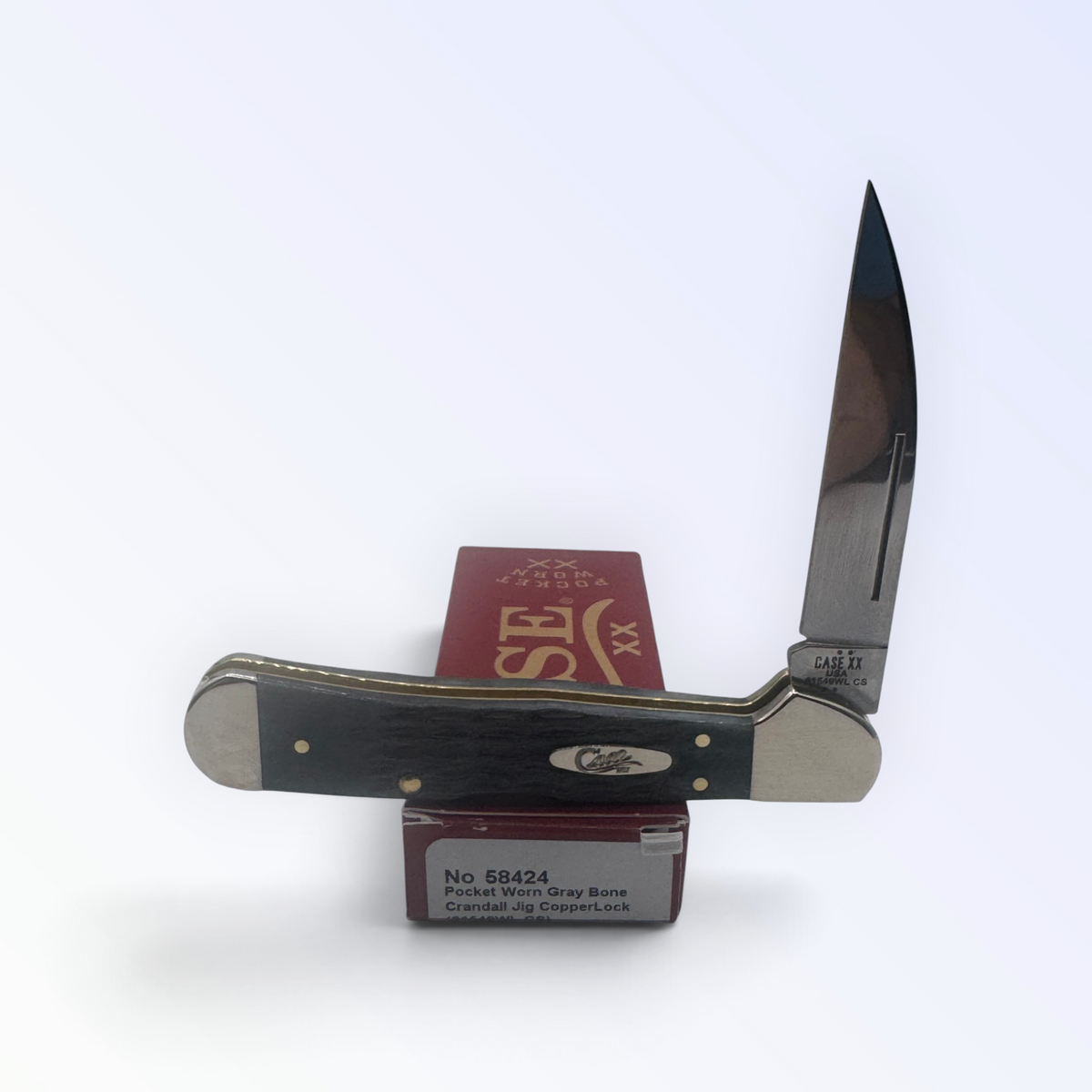 Case XX Copperlock 58424: Pocket Worn Gray Bone, angled view showing handle texture and bolsters