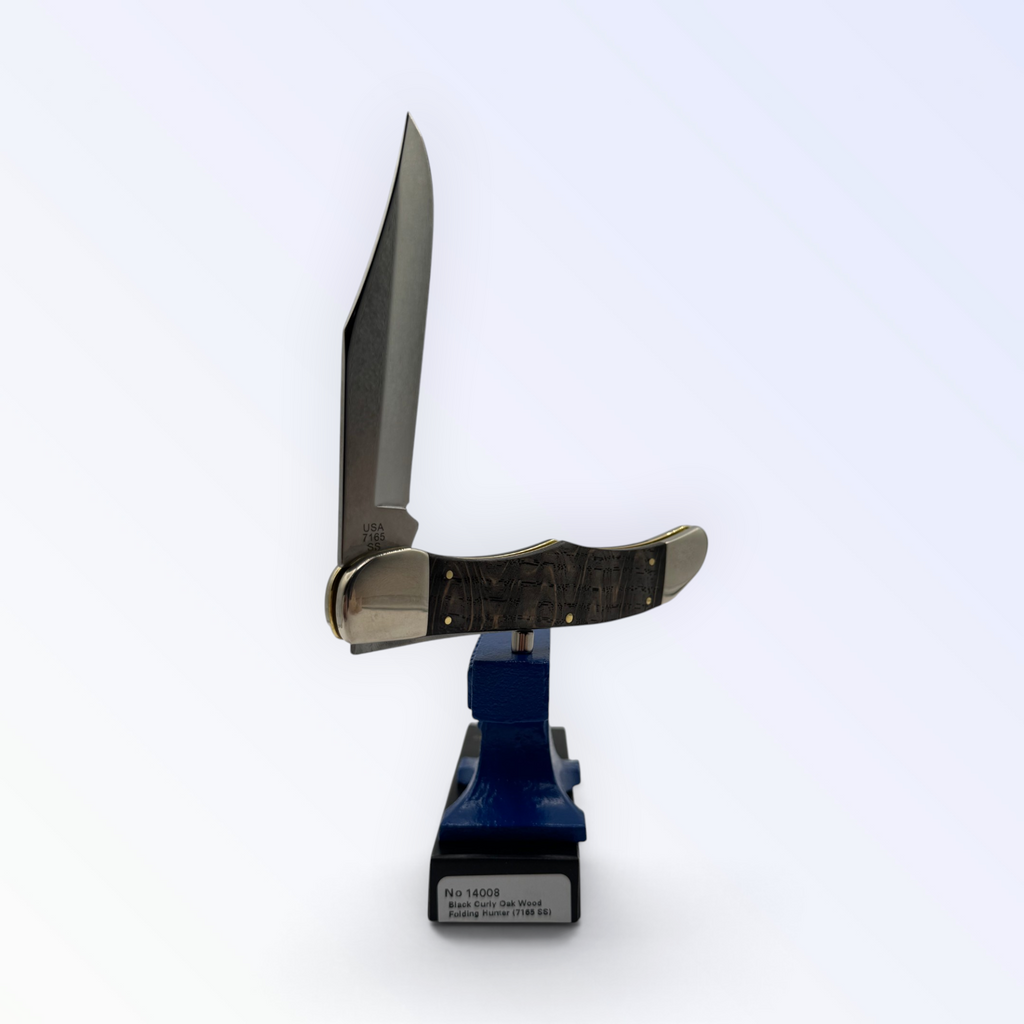 Catalog 14008 Case XX Folding Hunter — smooth black curly oak, close view of handle texture with blades open on box