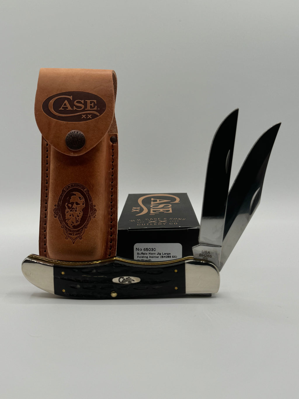 Case XX 65030 Folding Hunter, Jigged Buffalo Horn handles — open on box with end label visible