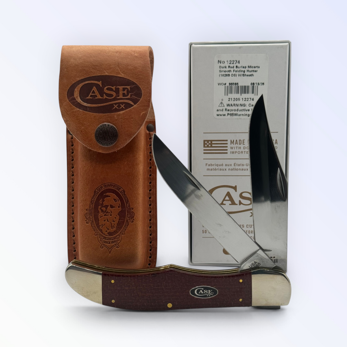 Pigeon Roost Knives Case XX Folding Hunter knife with dark red burlap Micarta handle, carbon steel blades, and sheath.