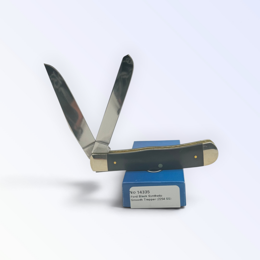 Ford F-150 Trapper Smooth Black Delrin by Case XX (14335), close view of handle texture with blades open on box