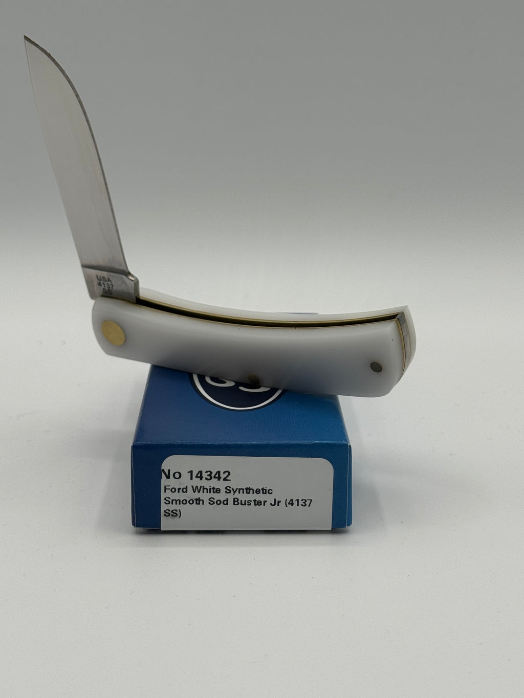 Catalog 14342 Case XX Ford Sod Buster Jr White The Universal Car — open blades resting on factory packaging