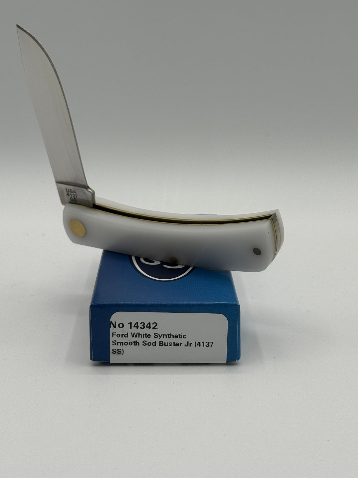 Catalog 14342 Case XX Ford Sod Buster Jr White The Universal Car — open blades resting on factory packaging