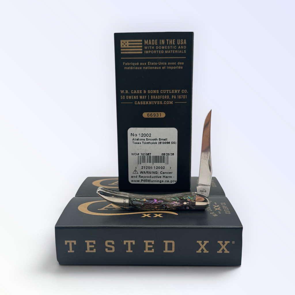 Case XX Genuine Abalone Tiny Toothpick with SKU 12002 — blades open resting on the factory box