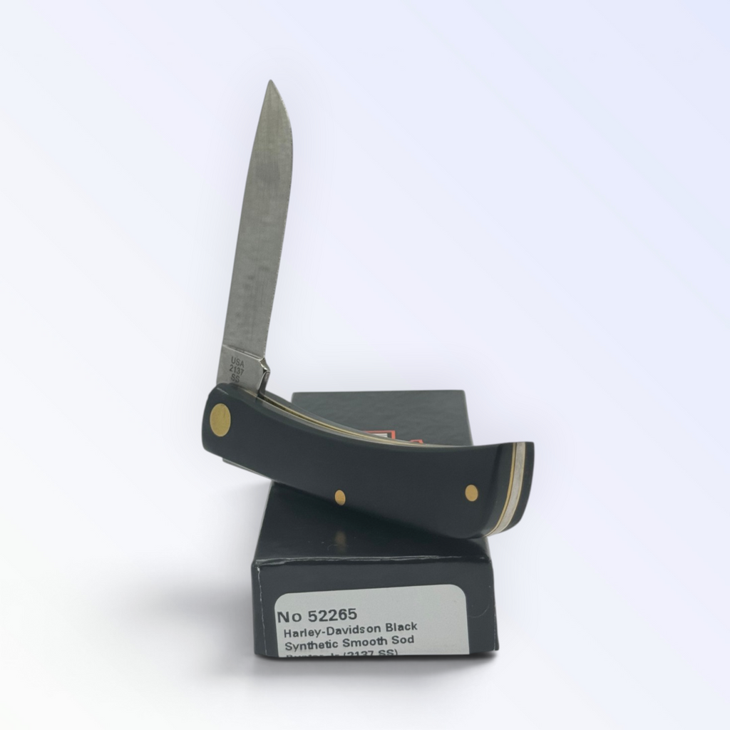 Catalog 52265 Case XX Harley-Davidson Sodbuster Jr Black Delrin — open blades resting on factory packaging