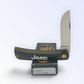 Case XX Jeep Black Synthetic Sodbuster Jr with SKU 27015 — blades open resting on the factory box