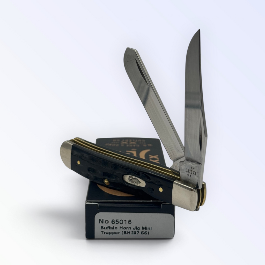 Case XX 65016 Jigged Genuine Buffalo Horn Mini Trapper — angled open view on Case XX packaging