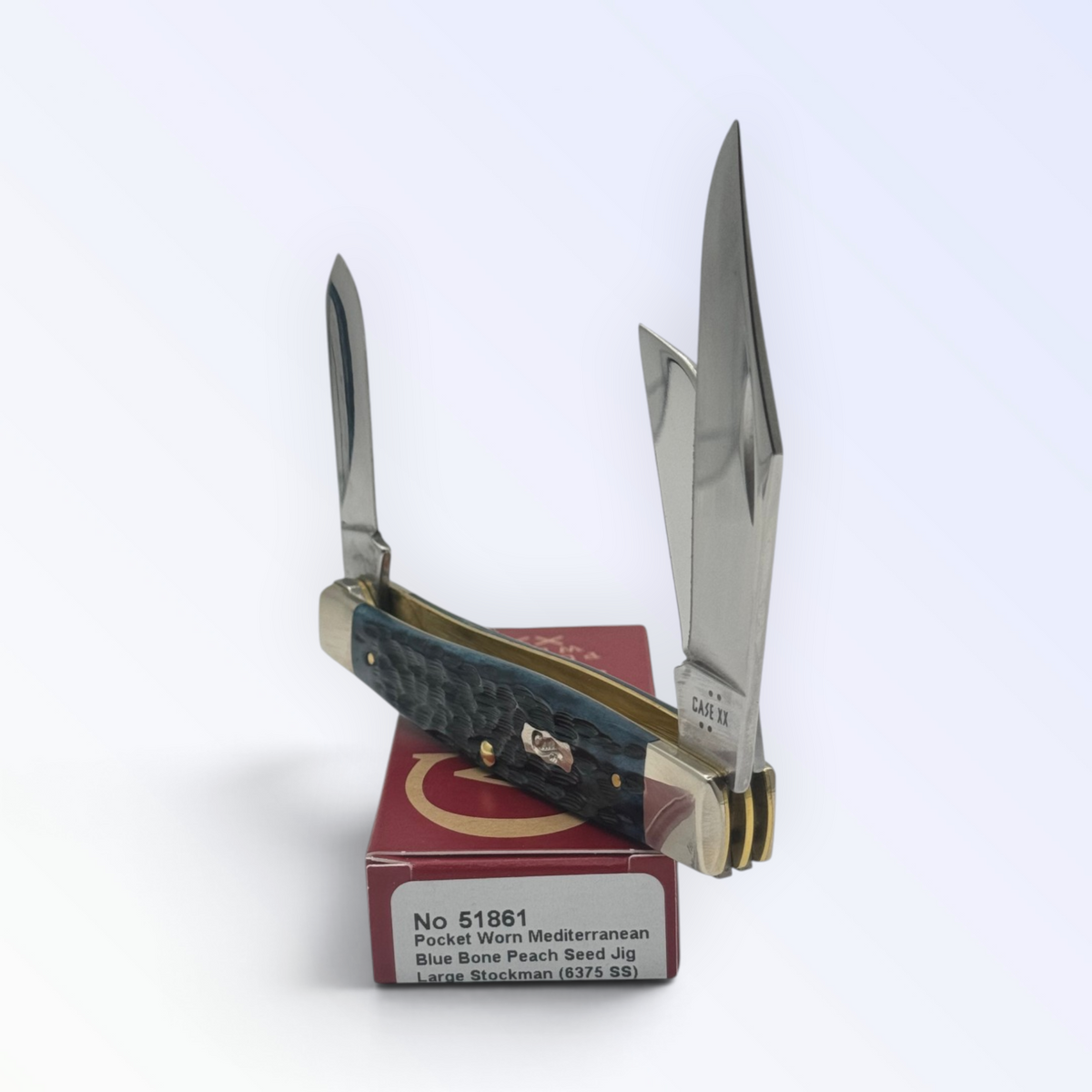 Case XX 51861 Large Stockman Pocket Worn Mediterranean Blue Bone — angled open view on Case XX packaging