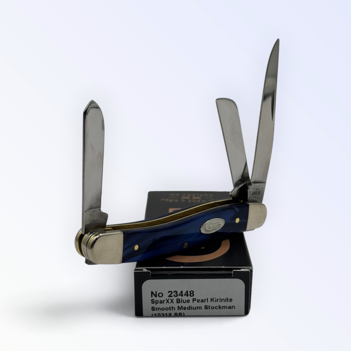 Medium Stockman by Case XX in blue pearl Kirinite (23448), three-quarter open shot showing handle and blades